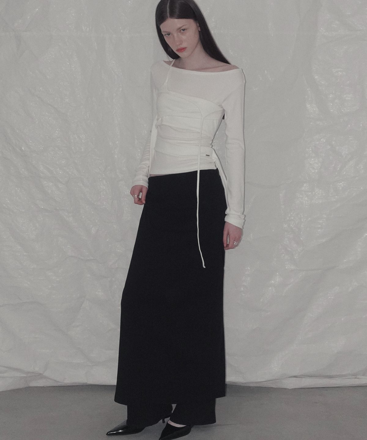 그로우하이드(GROWHIDE) 릴디브 폴딩 펀칭 맥시 롱 스커트_블랙