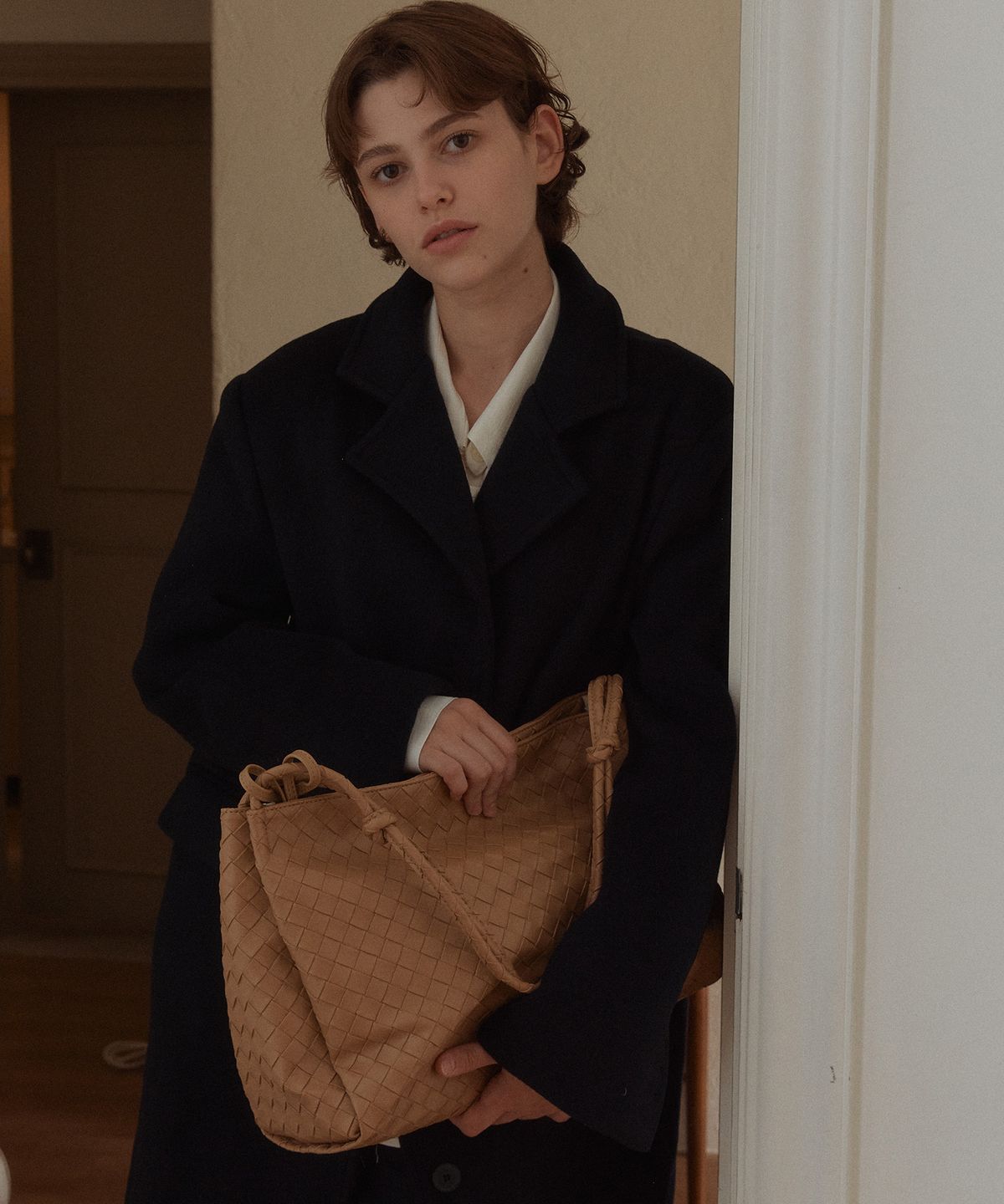 아노에틱(ANOETIC) ANC WEAVING MESH STRING BAG_CAMEL