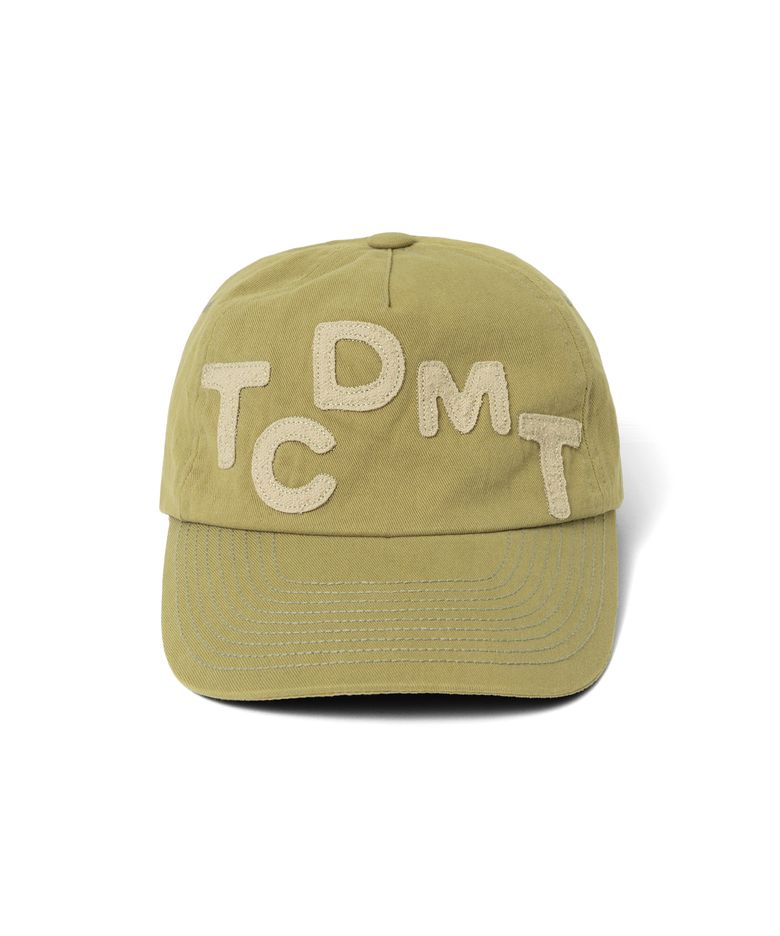 TCM logo typo cap (olive)
