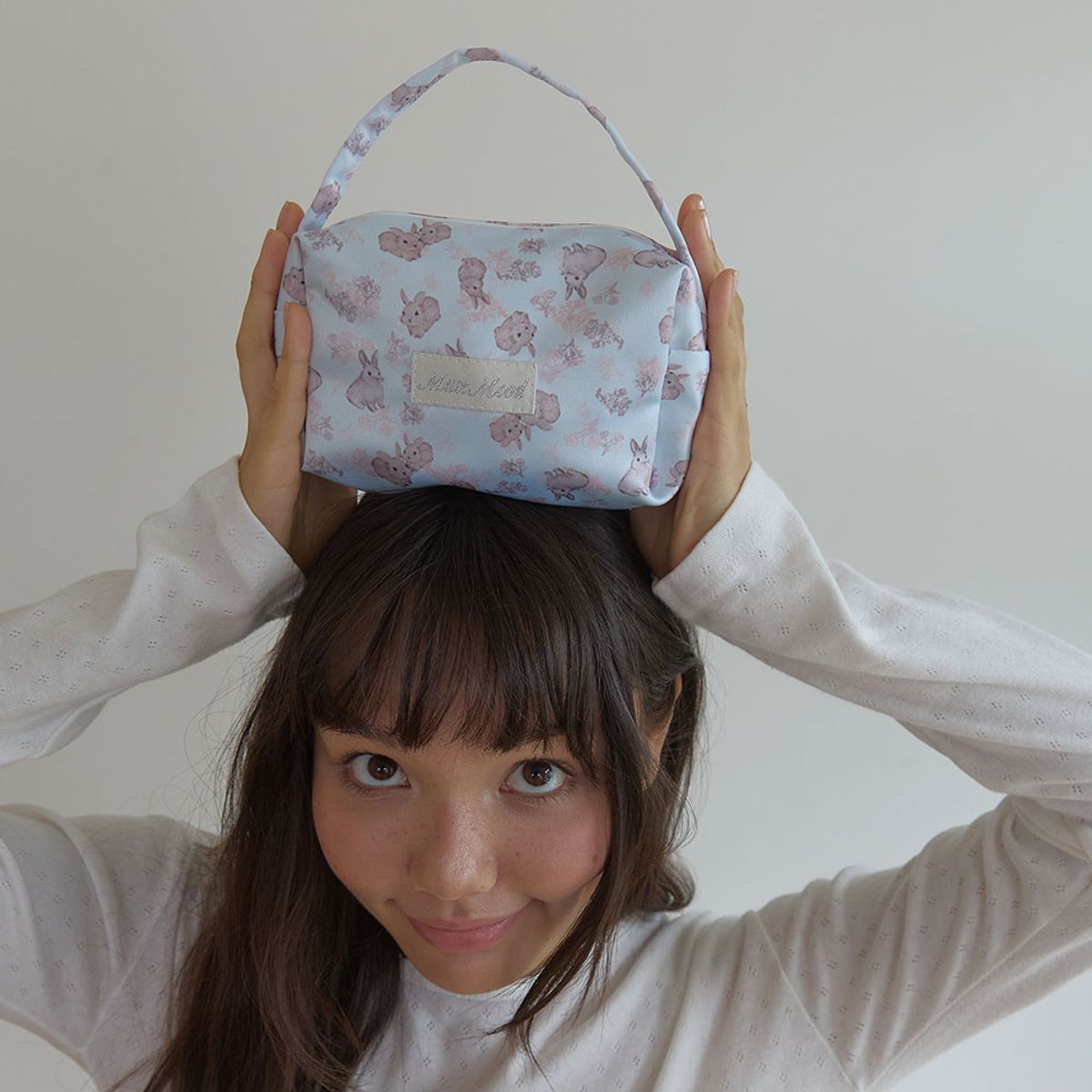 뮤즈무드(MUSEMOOD) mint mini bunnies hand bag pouch (핸드파우치백)