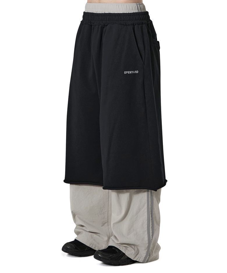 LAYERED CUT-OFF PANTS - BLACK / GREY