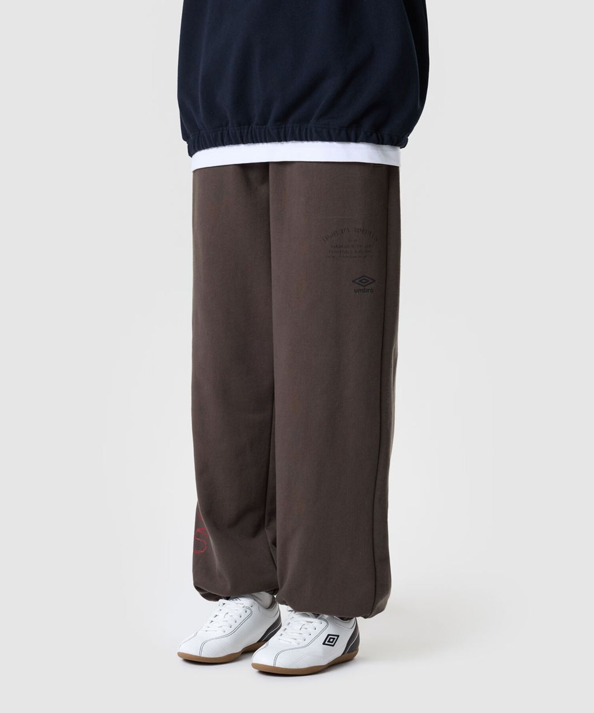 엄브로(UMBRO) 더비클럽 니트 조거 팬츠 브라운 UR311CFP92