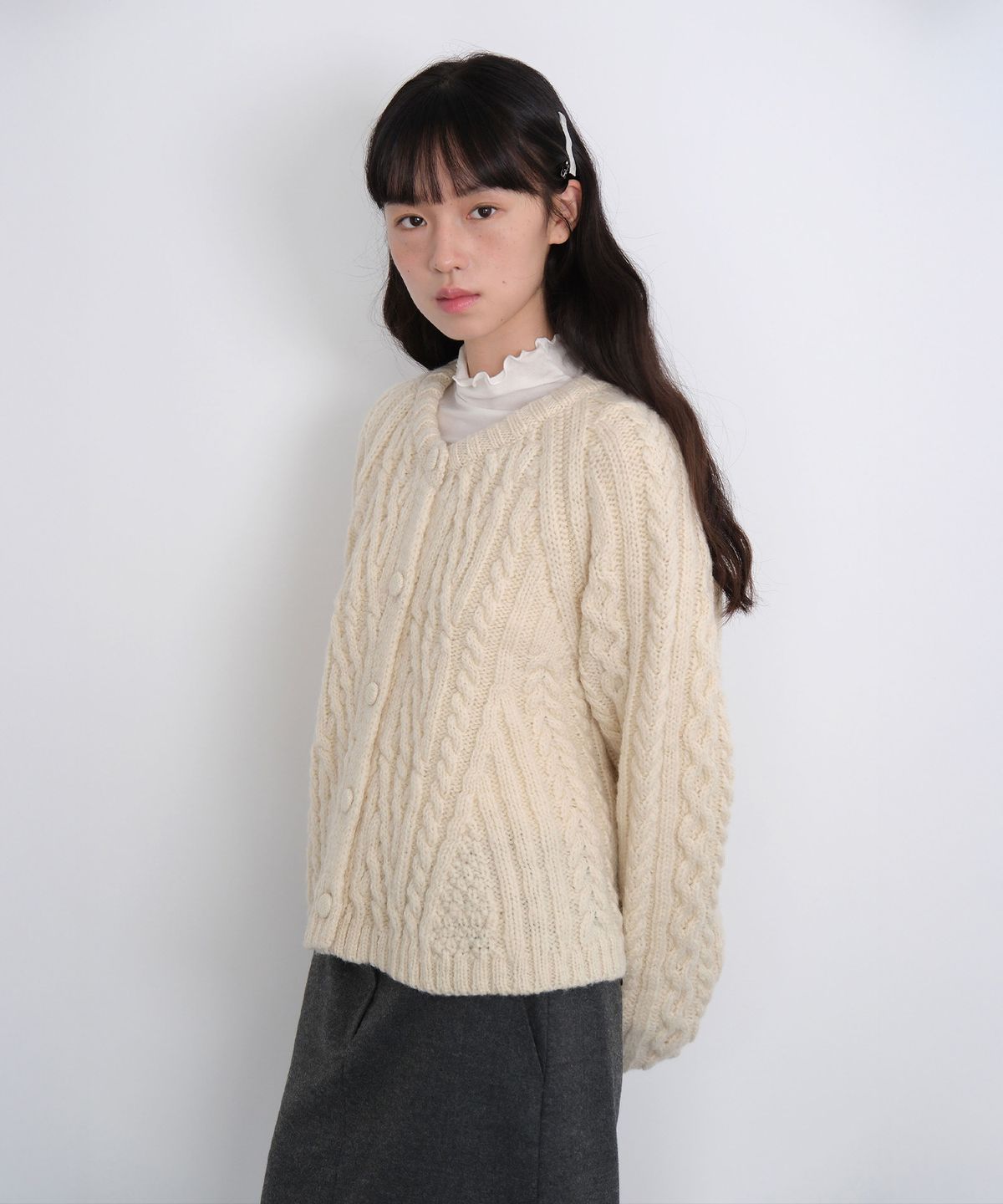 모의(MOUI) Flare cable knit cardigan (CREAM)