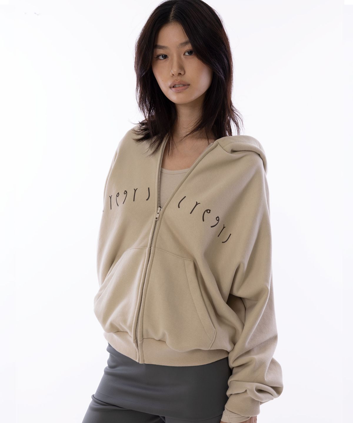 라이라이(LYELYE) LYEX2 Logo Symbol Loose-Fit Hood Zip Up [Beige]