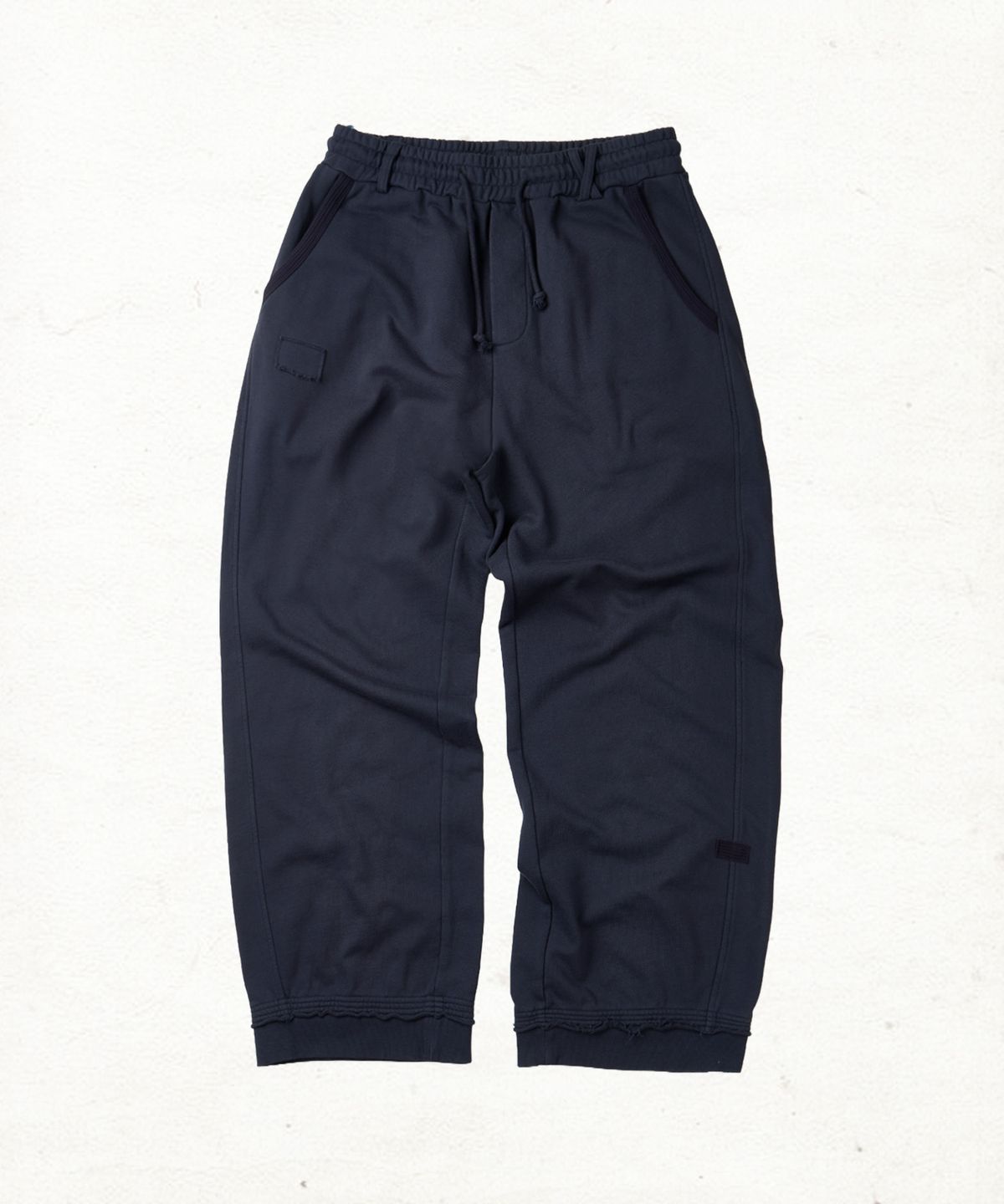 단델(DANDEL) DD mending patch rib sweat pants (NAVY)