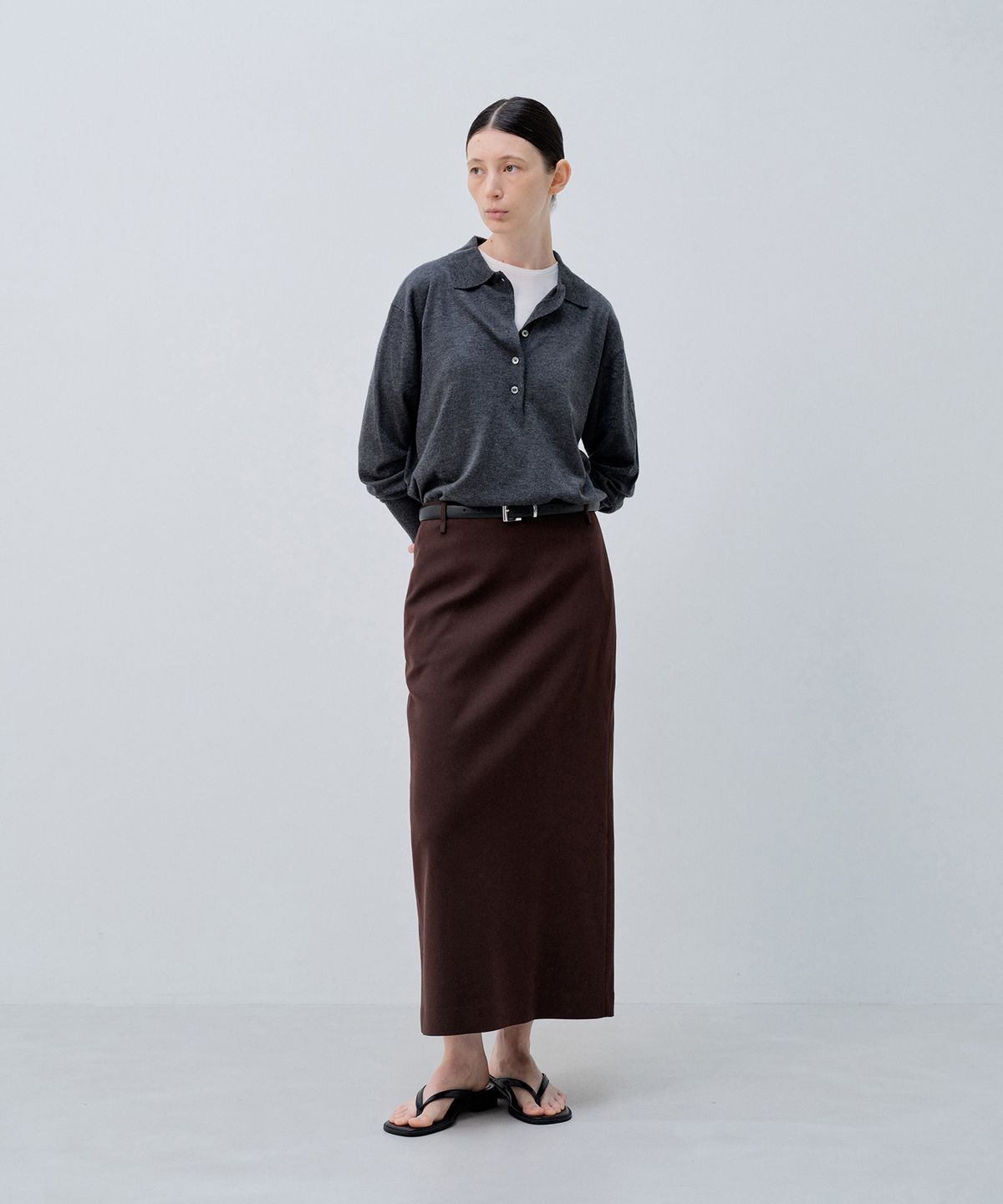 노티아(NOTIA) STANDARD FIT LONG SKIRT_DARK BROWN
