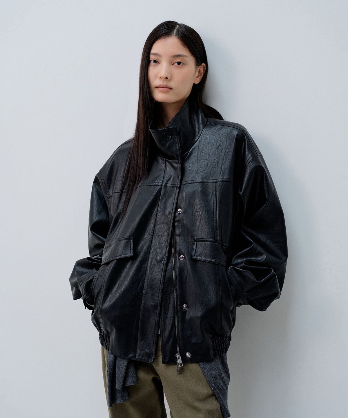 노티아(NOTIA) OUT POCKET HIGH NECK LEATHER BLOUSON_BLACK