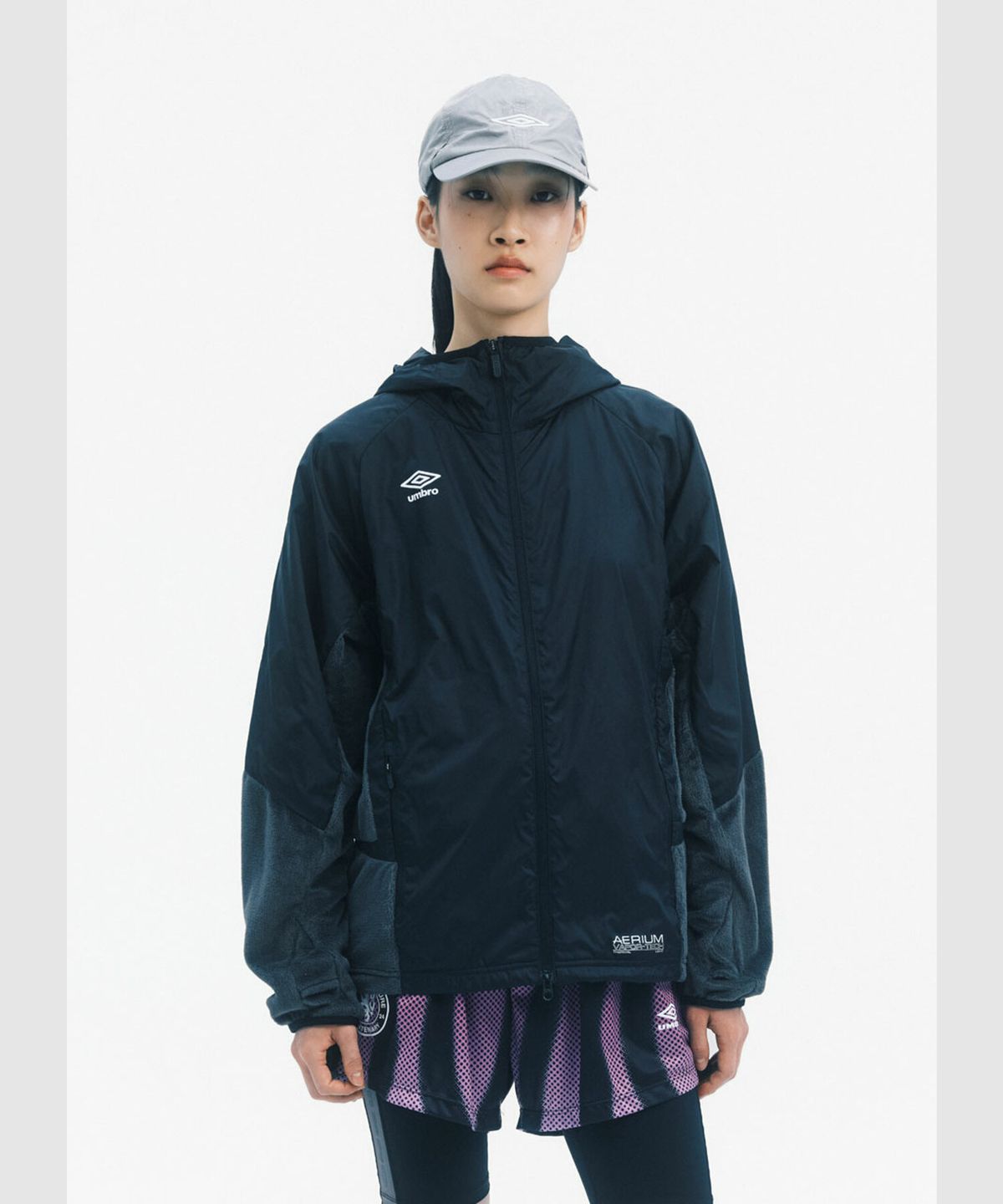 엄브로(UMBRO) 에어리움 경량 플리스 하이브리드 자켓 블랙 UR321SJK93
