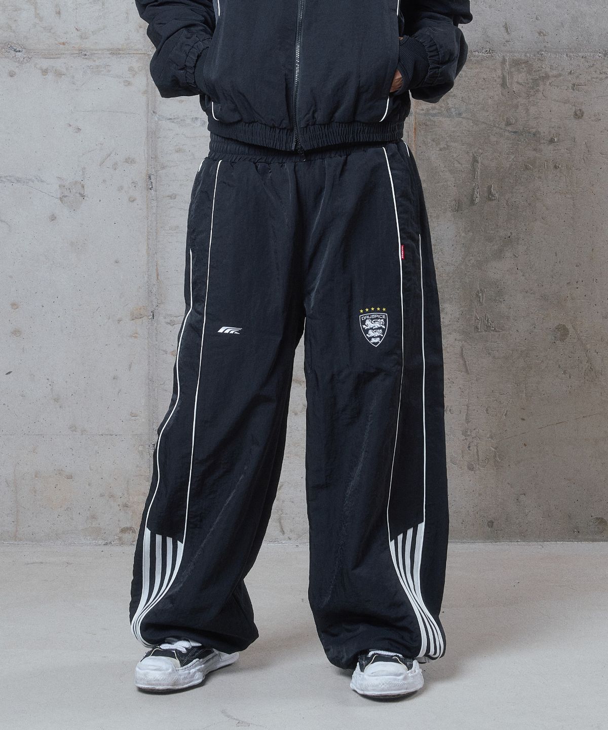 디오스피스(DAUSPICE) (DUC) Hooligan Wide Track Pants Black