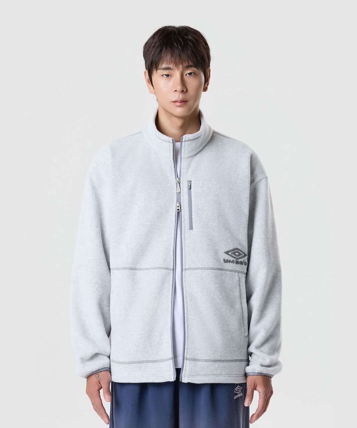 엄브로(UMBRO) 크리스피 타슬란 플리스 자켓 화이트 UR324CFJ91