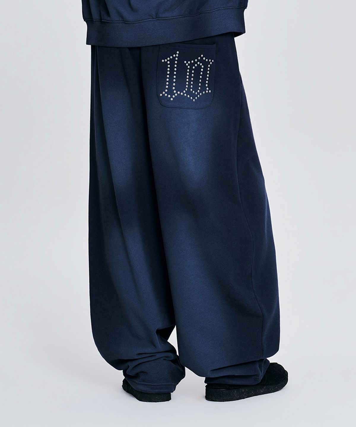 마하그리드(MAHAGRID) [10주년] WASHED 10TH THIRD LOGO BALLOON SWEAT PANTS 2colors