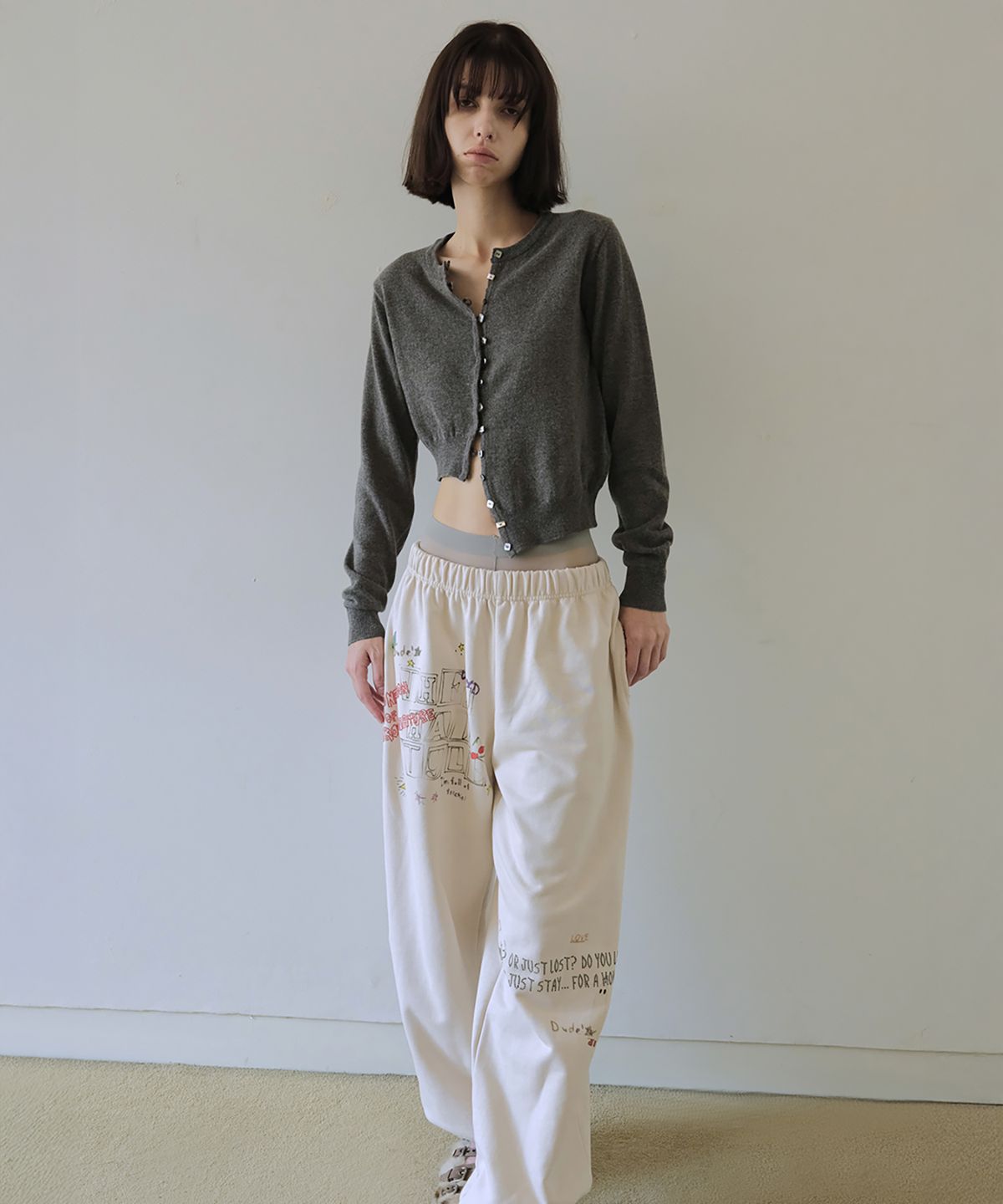 더블유케이엔디 프로젝트(WKND PROJECT) ASYMMETRIC KNIT CARDIGAN (CHARCOAL)