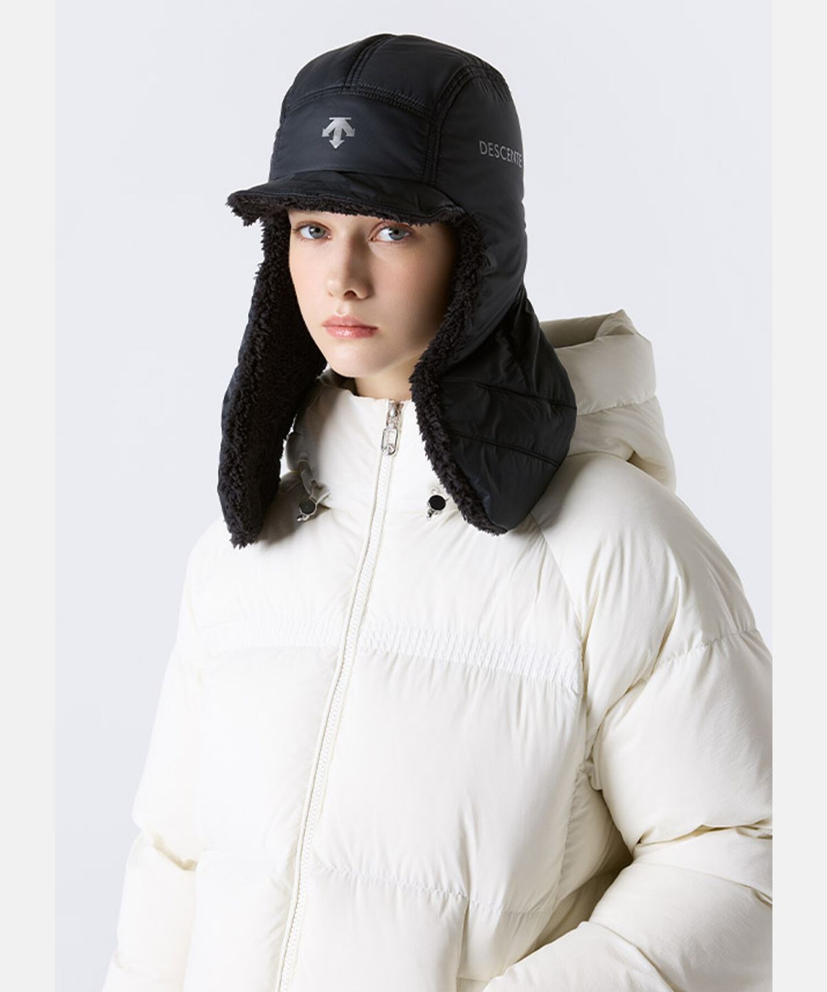데상트(DESCENTE) 스위스 스키 퍼텍스 리버시블 트루퍼 햇 블랙 SR323ICP92
