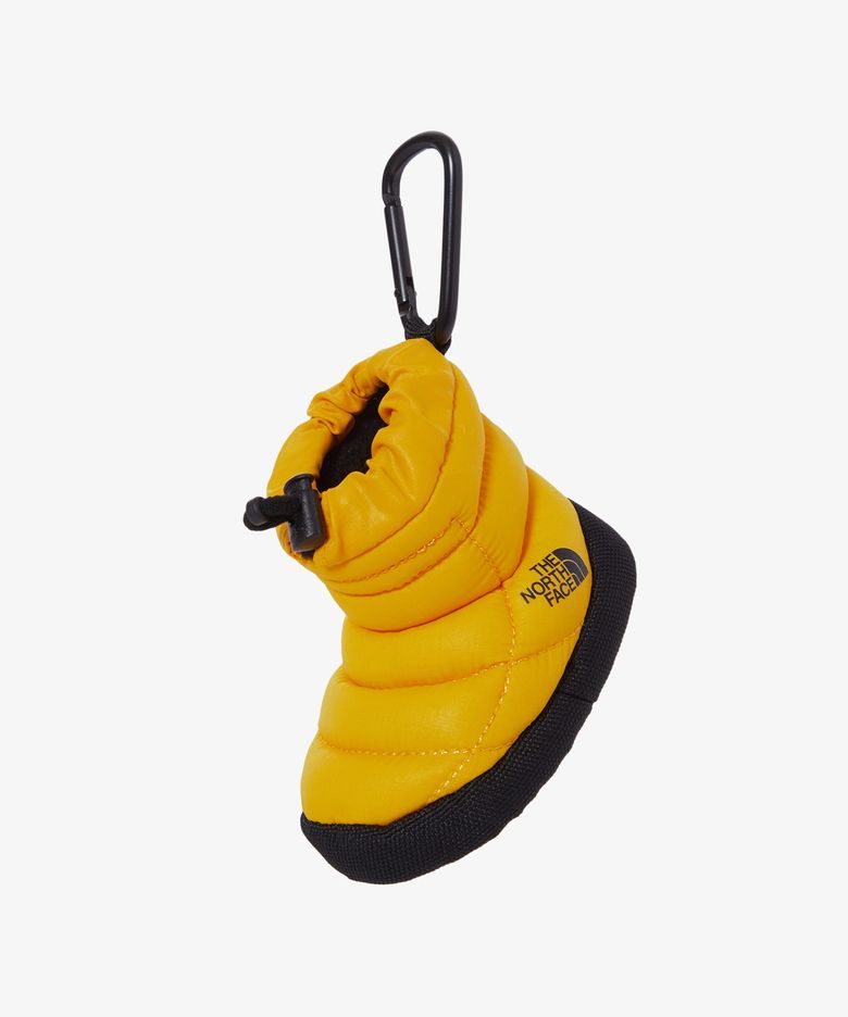 NA5AS56D 눕시 부츠 키링 YELLOW