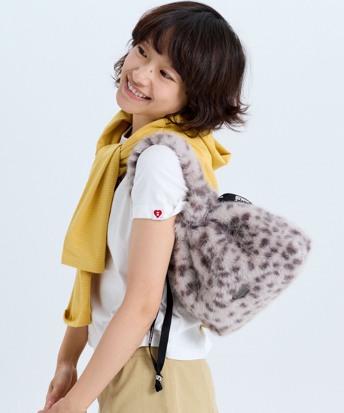 마크니(MACNI) POPO LEOPARD STRING POUCH BAG GREY