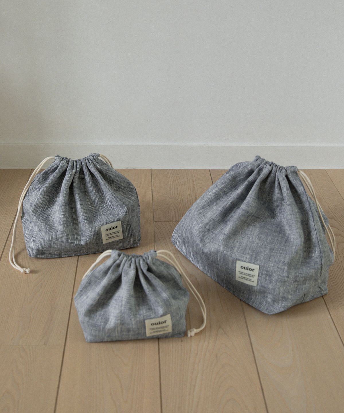 위올(OUIOR) [기프트박스]ouior chubby string pouch_herringbone navy