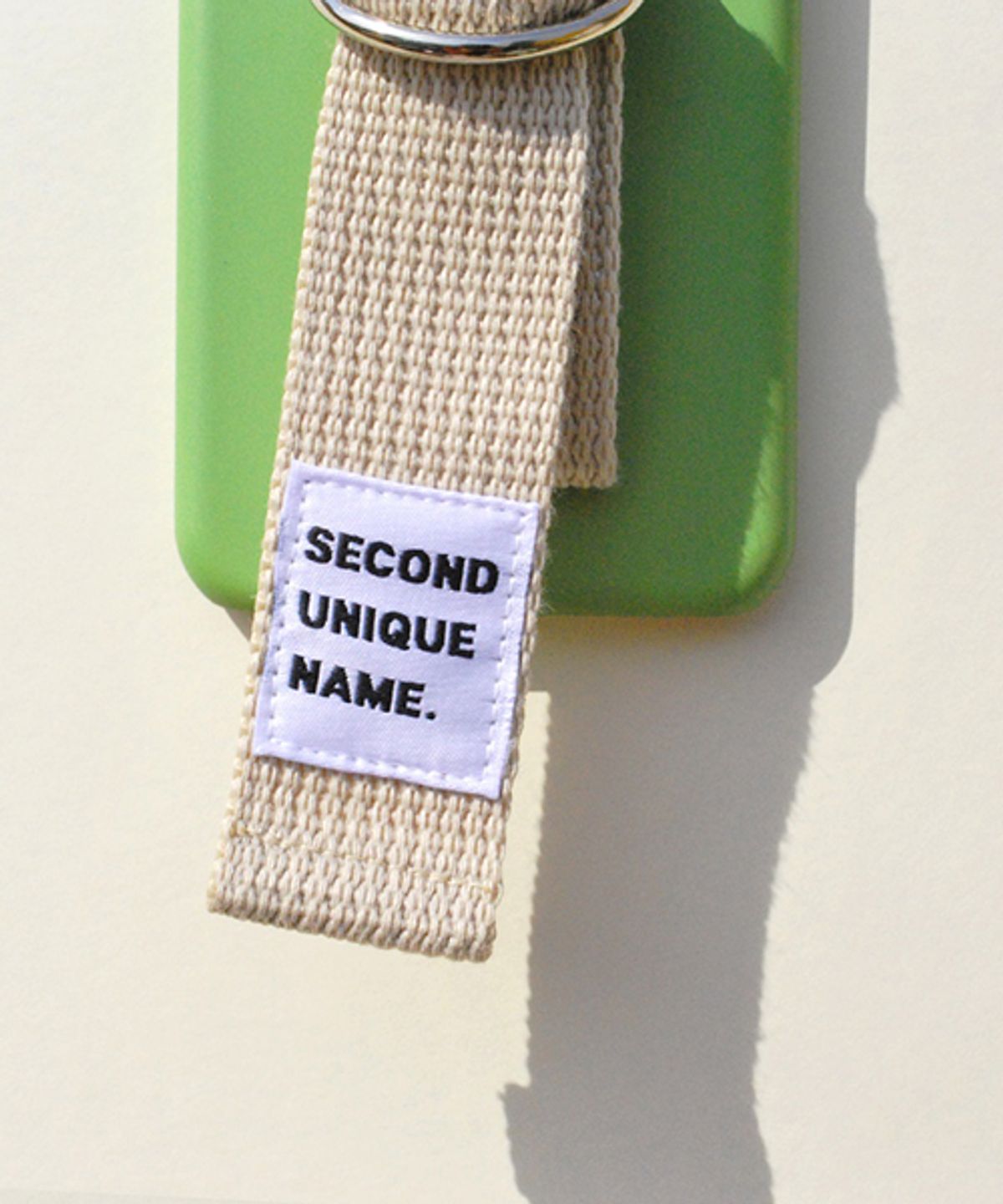 세컨드유니크네임(SECOND UNIQUE NAME) SUN CASE LIGHT GREEN IVORY (WORD)