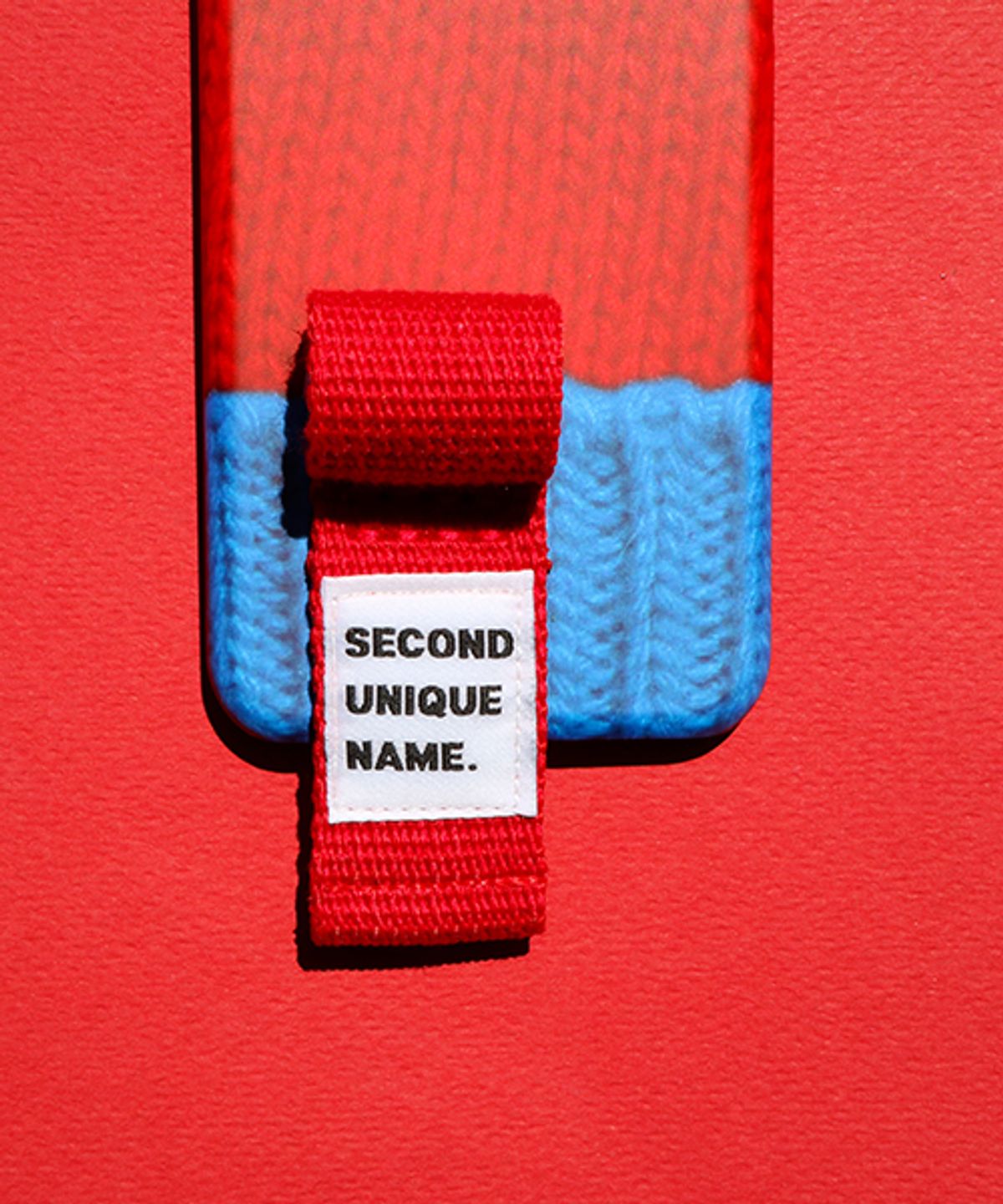 세컨드유니크네임(SECOND UNIQUE NAME) SUN CASE FINGER SWEATER RED BLUE