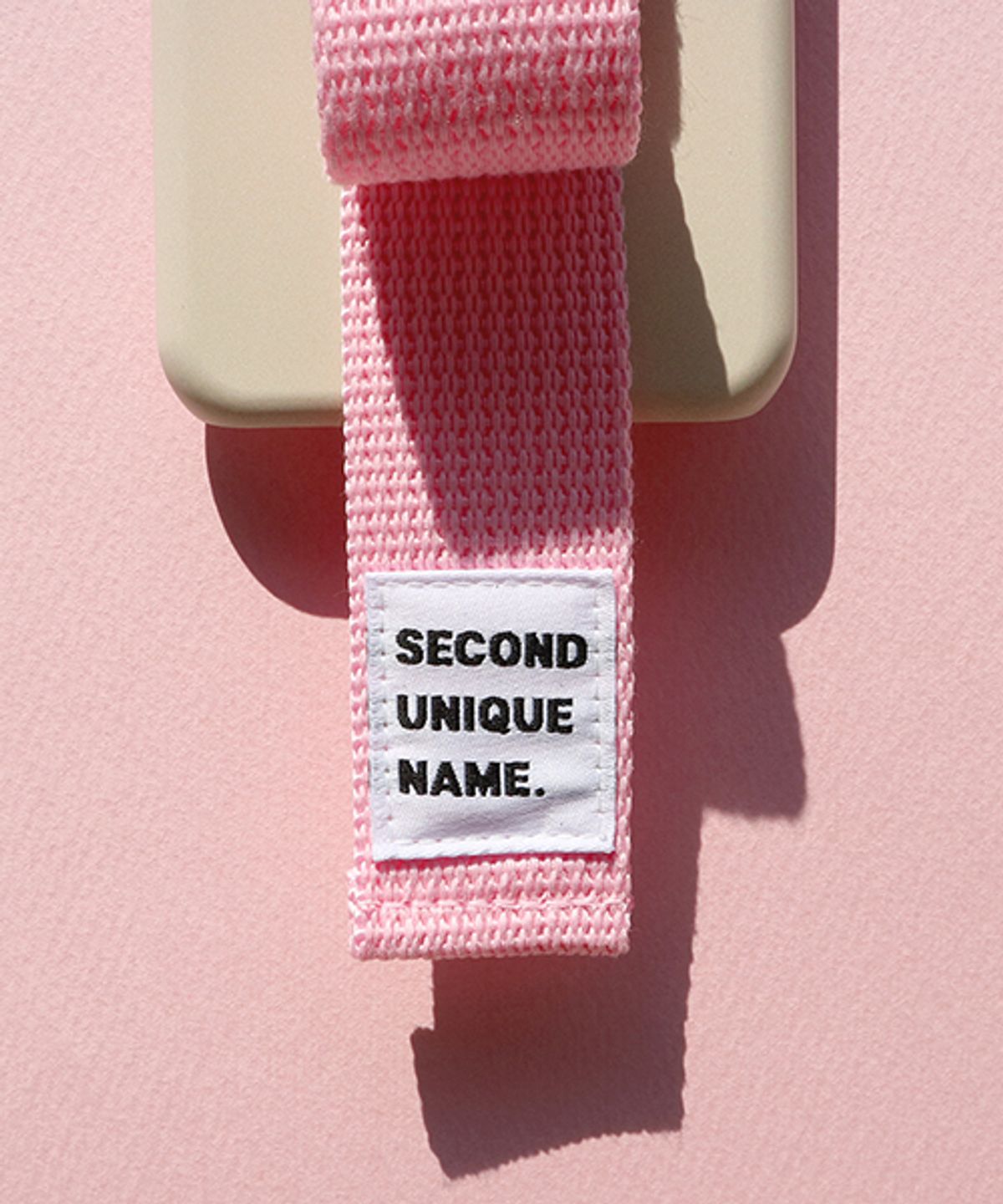 세컨드유니크네임(SECOND UNIQUE NAME) SUN CASE RIBBON IVORY LIGHT PINK