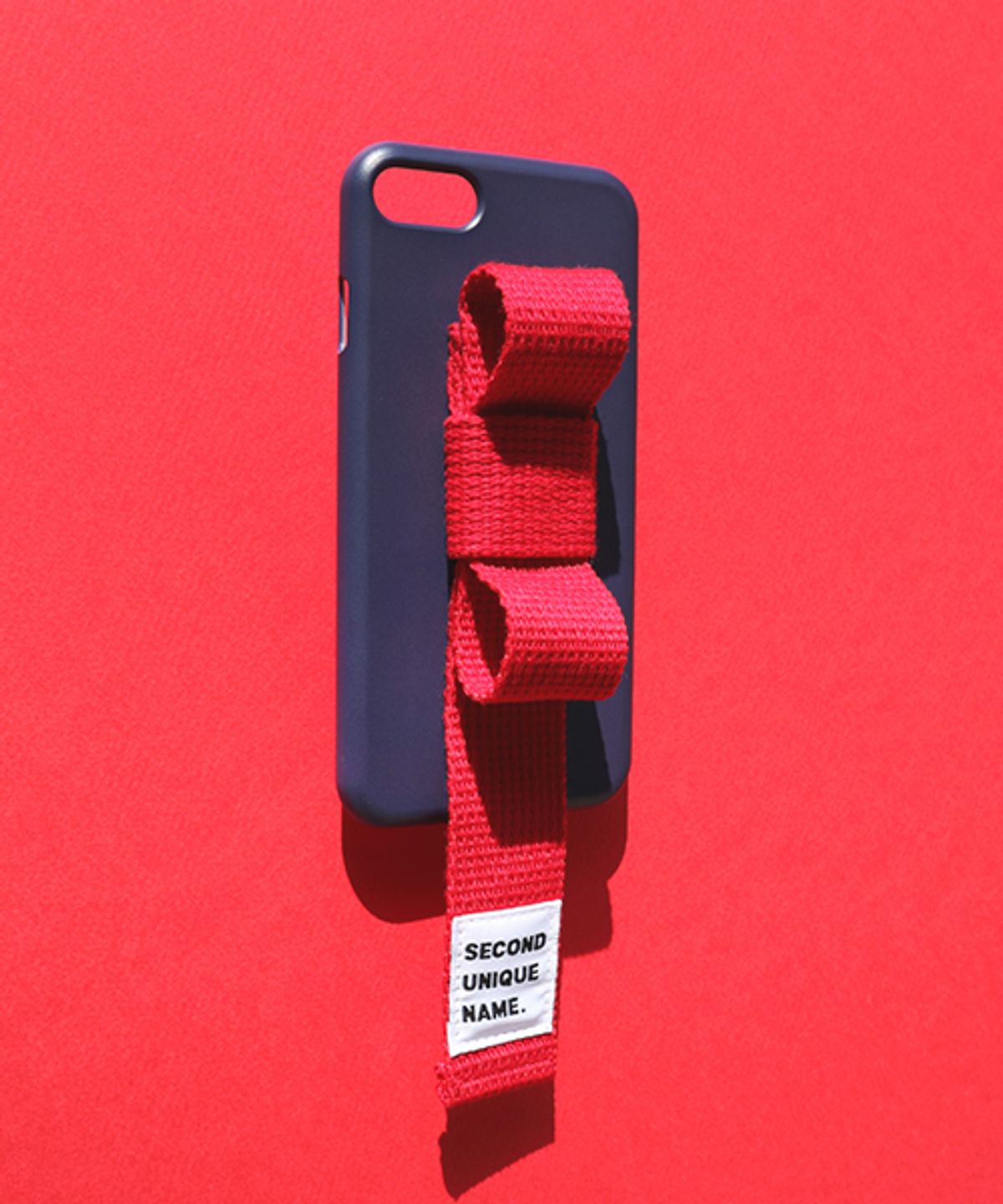 세컨드유니크네임(SECOND UNIQUE NAME) SUN CASE RIBBON NAVY RED