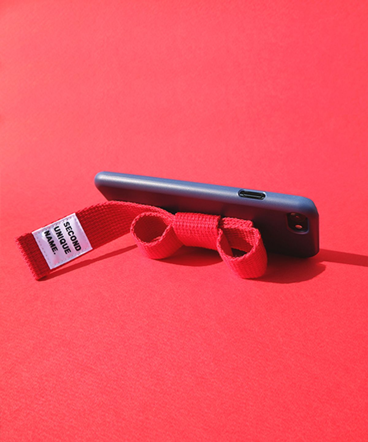 세컨드유니크네임(SECOND UNIQUE NAME) SUN CASE RIBBON NAVY RED