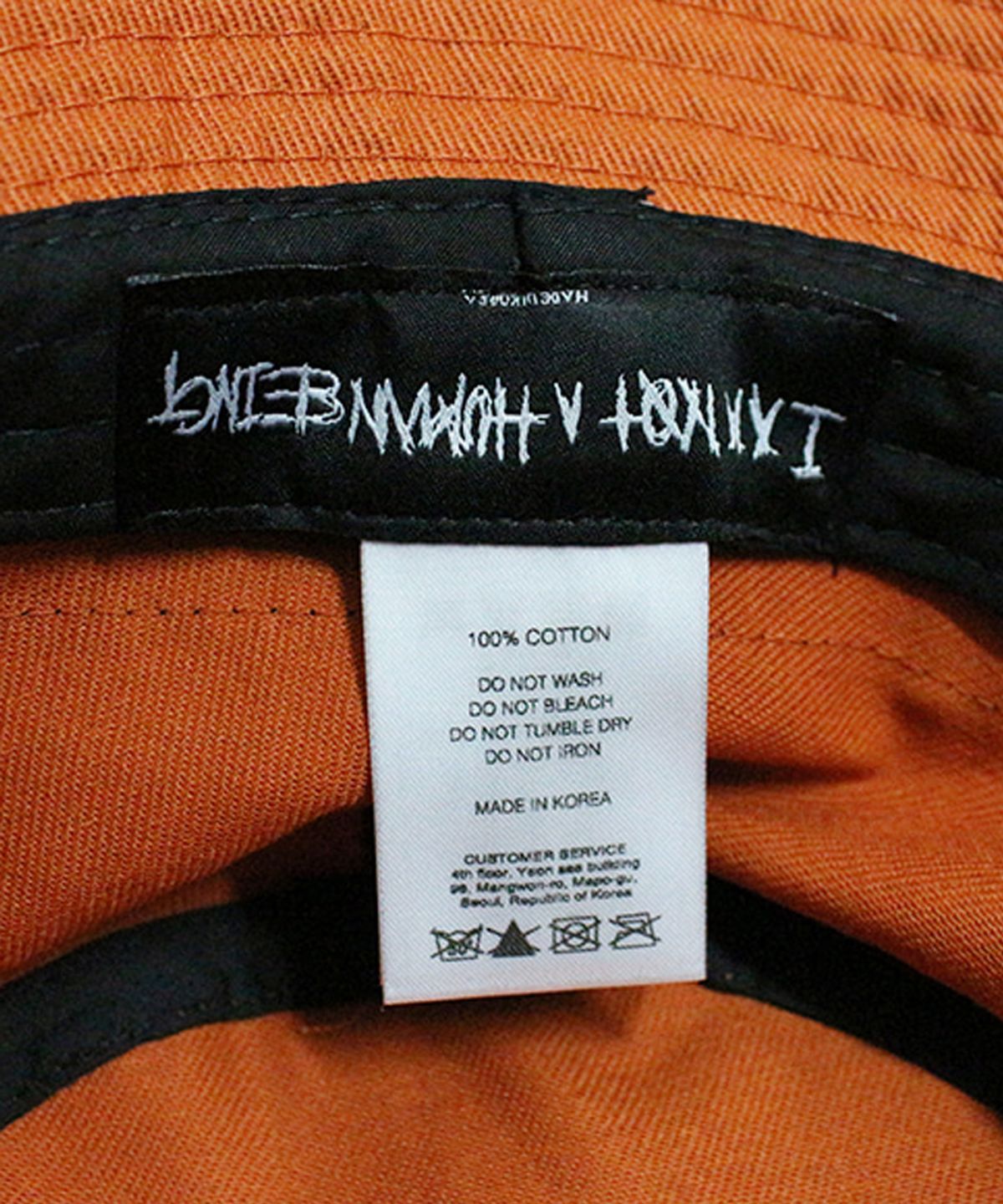아임낫어휴먼비잉(I AM NOT A HUMAN BEING) Basic Logo Tape Bucket Hat - Orange