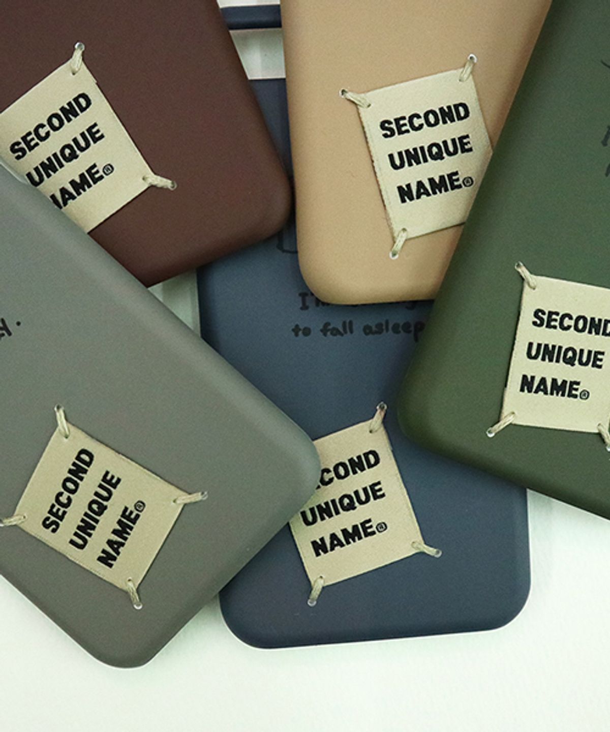 세컨드유니크네임(SECOND UNIQUE NAME) SUN CASE GRAPHIC STORY OF FALL COFFEE BEIGE (BEIGE TAG)