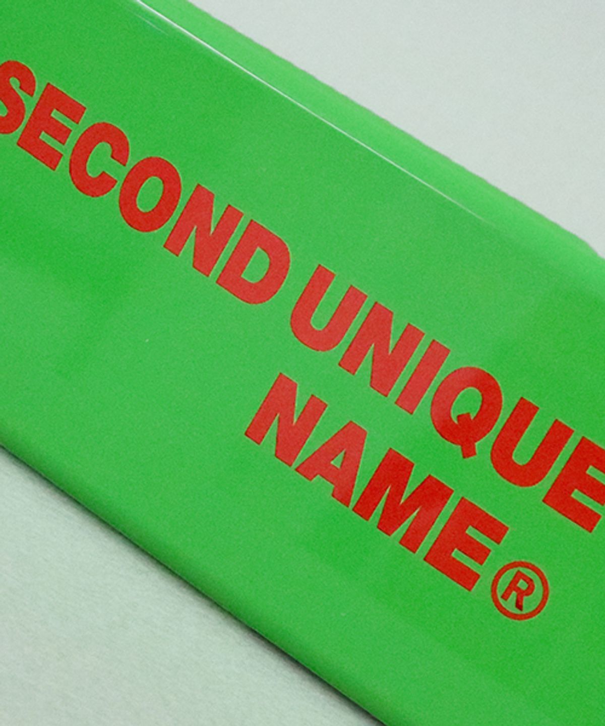 세컨드유니크네임(SECOND UNIQUE NAME) SUN CASE LOGO GREEN