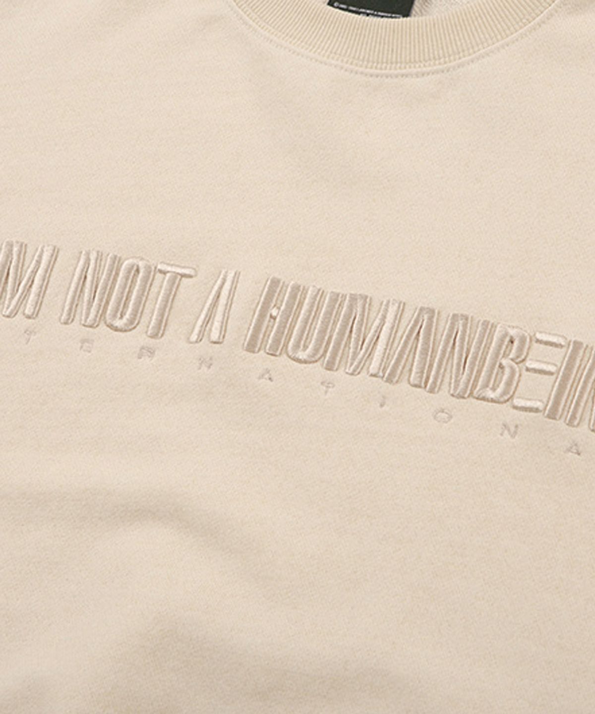 아임낫어휴먼비잉(I AM NOT A HUMAN BEING) Embroidered Crewneck Sweatshirt - BEIGE
