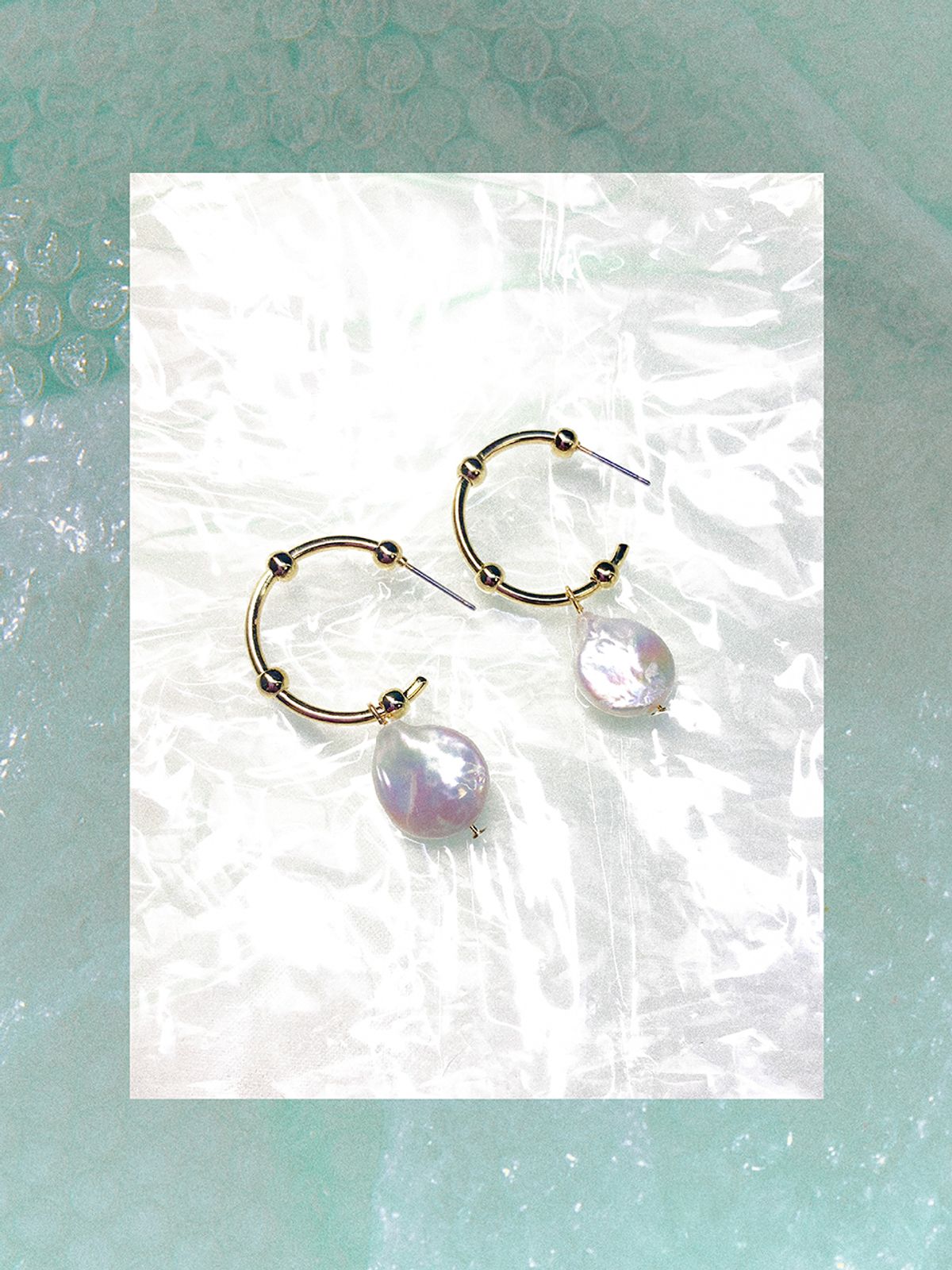 원이너프(ONE ENOUGH) Baroque Pearl Circle Earrings