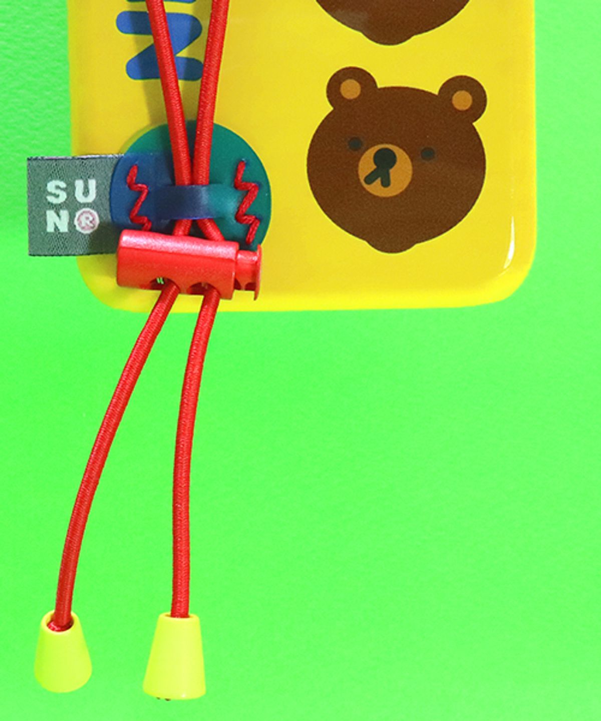 세컨드유니크네임(SECOND UNIQUE NAME) SUN CASE STRING GLOSSY YELLOW