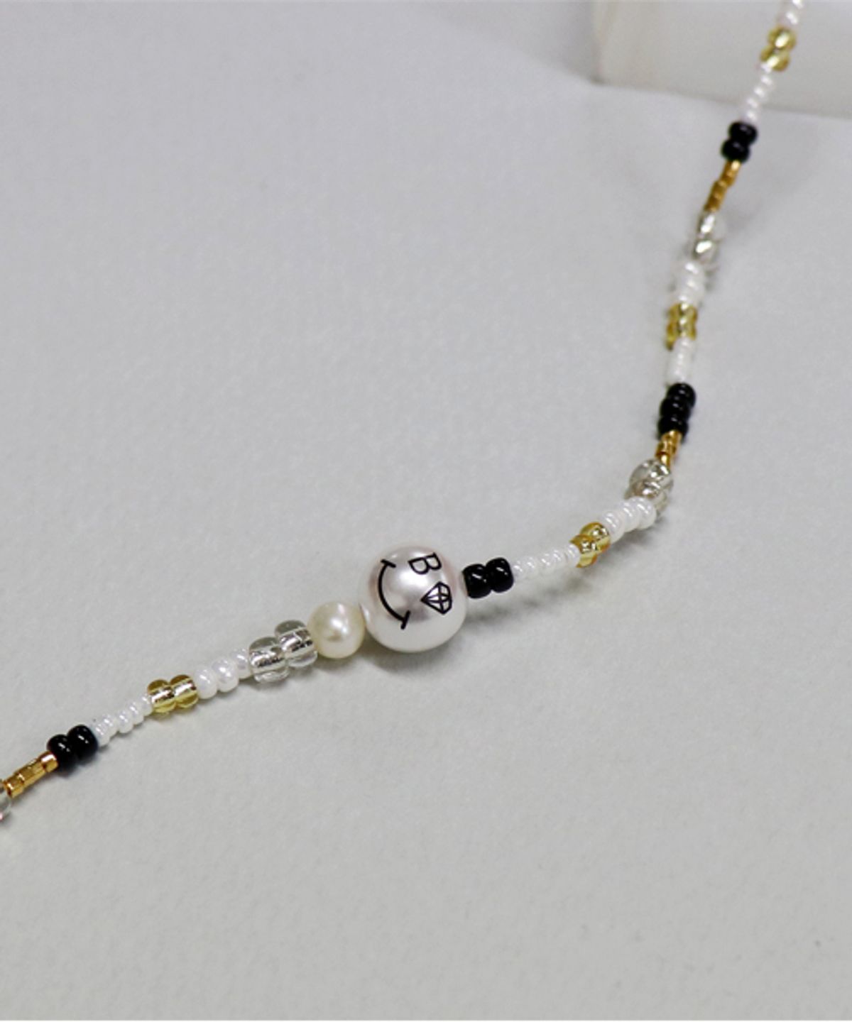 봉보(BONBEAU) Pearl smile gold beads Necklace 진주 포인트 비즈목걸이