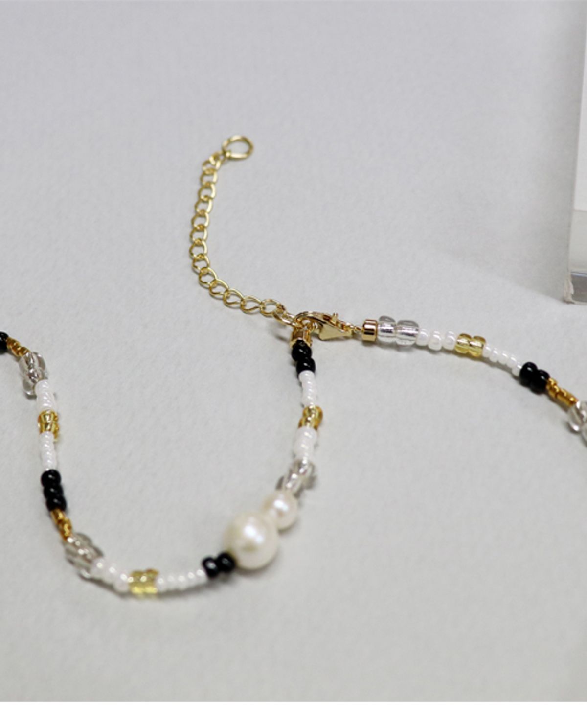 봉보(BONBEAU) Pearl smile gold beads Necklace 진주 포인트 비즈목걸이