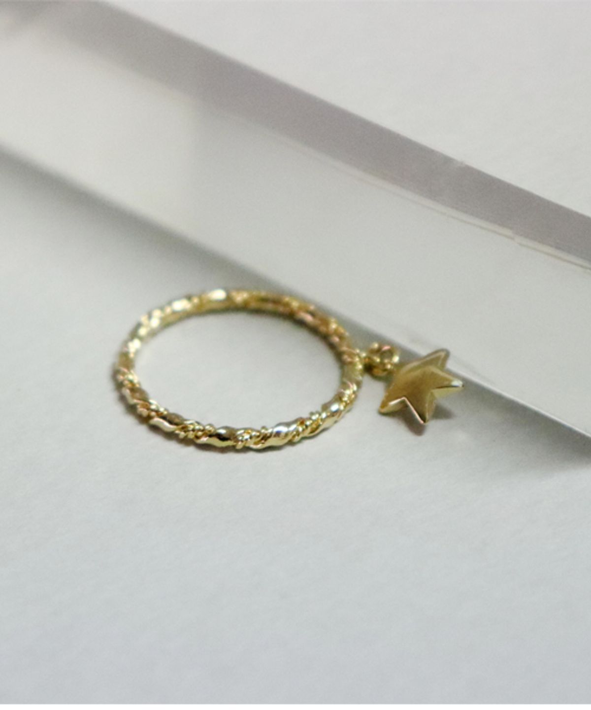 봉보(BONBEAU) Double twist star drop Ring 더블 트위스트 링 별 달랑이 반지