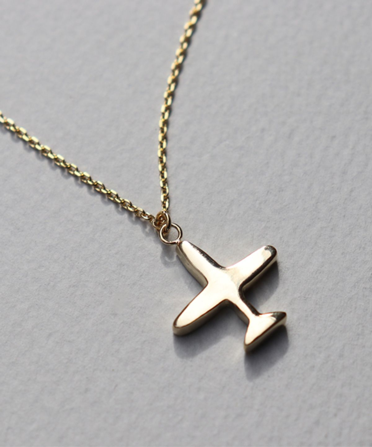 봉보(BONBEAU) Kitsch airplane pendant simple Necklace 비행기 팬던트 심플목걸이