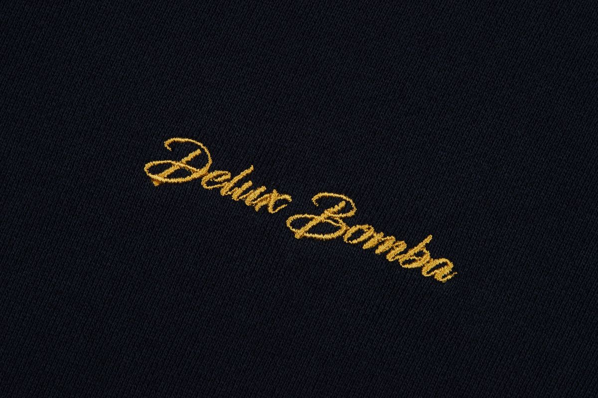 딜럭스 봄바(DELUX BOMBA) 클래시칼 스웨트셔츠 네이비