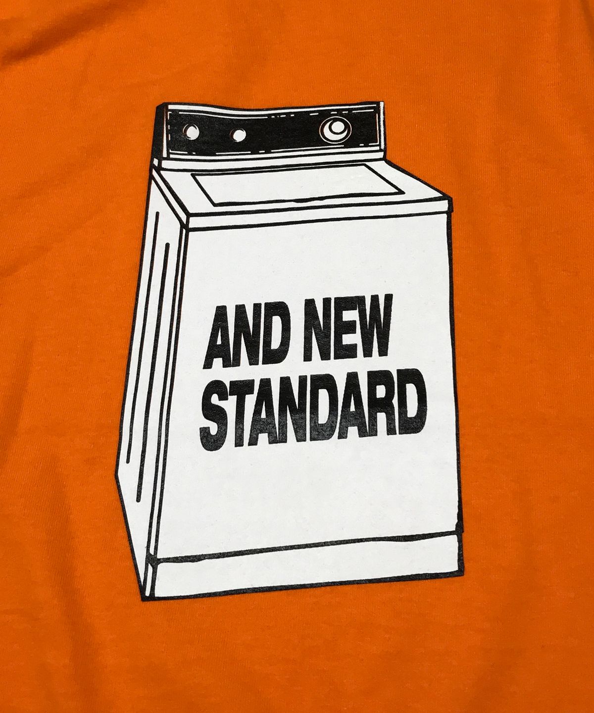 앤드 뉴스탠다드(AND NEWSTANDARD) 워싱머신 티셔츠 (오렌지)