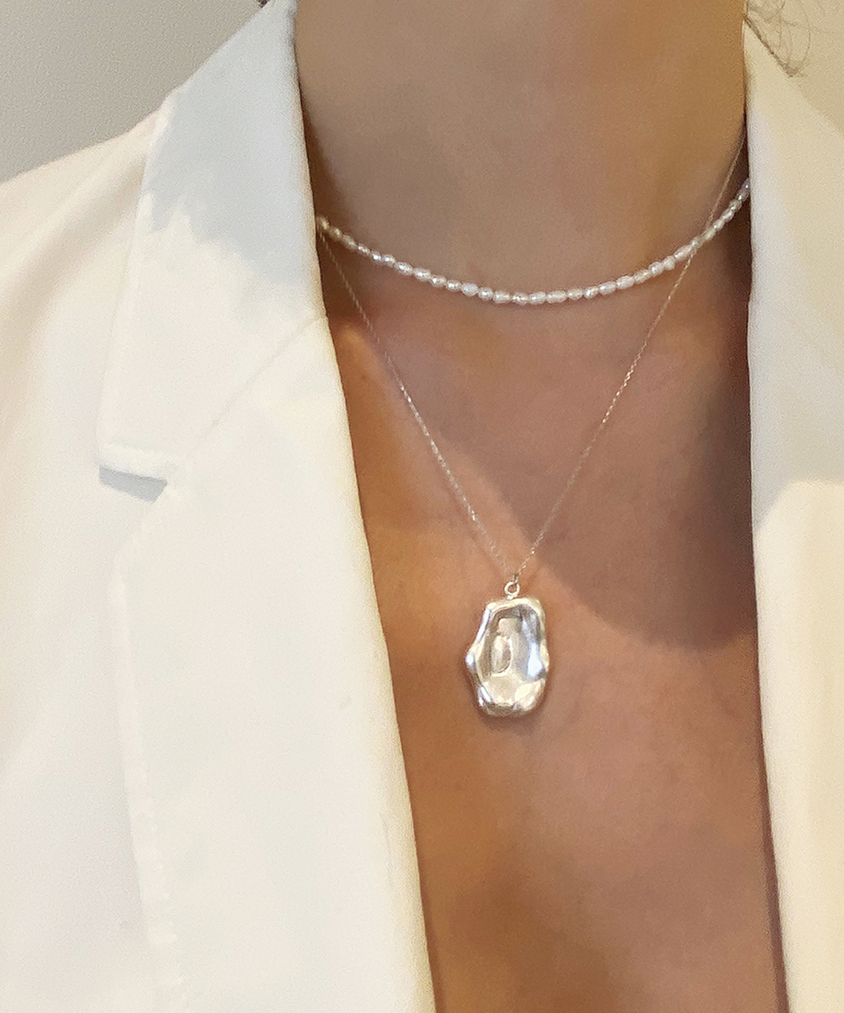 누아보(NUAVO) silver wave necklace