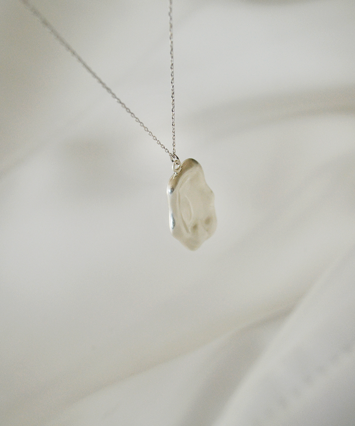 누아보(NUAVO) silver wave necklace
