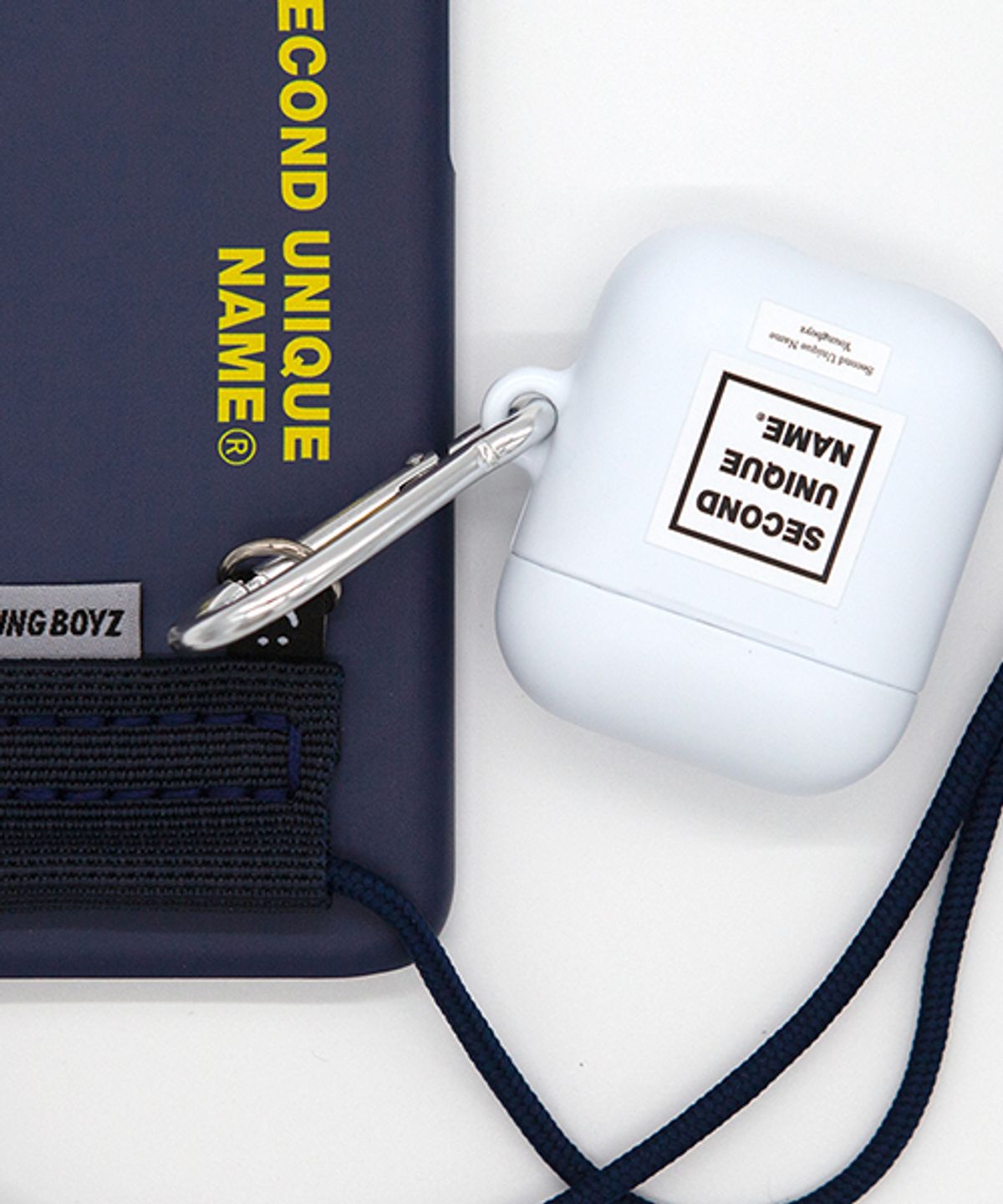 세컨드유니크네임(SECOND UNIQUE NAME) SUN CASE CROSS 2 NAVY