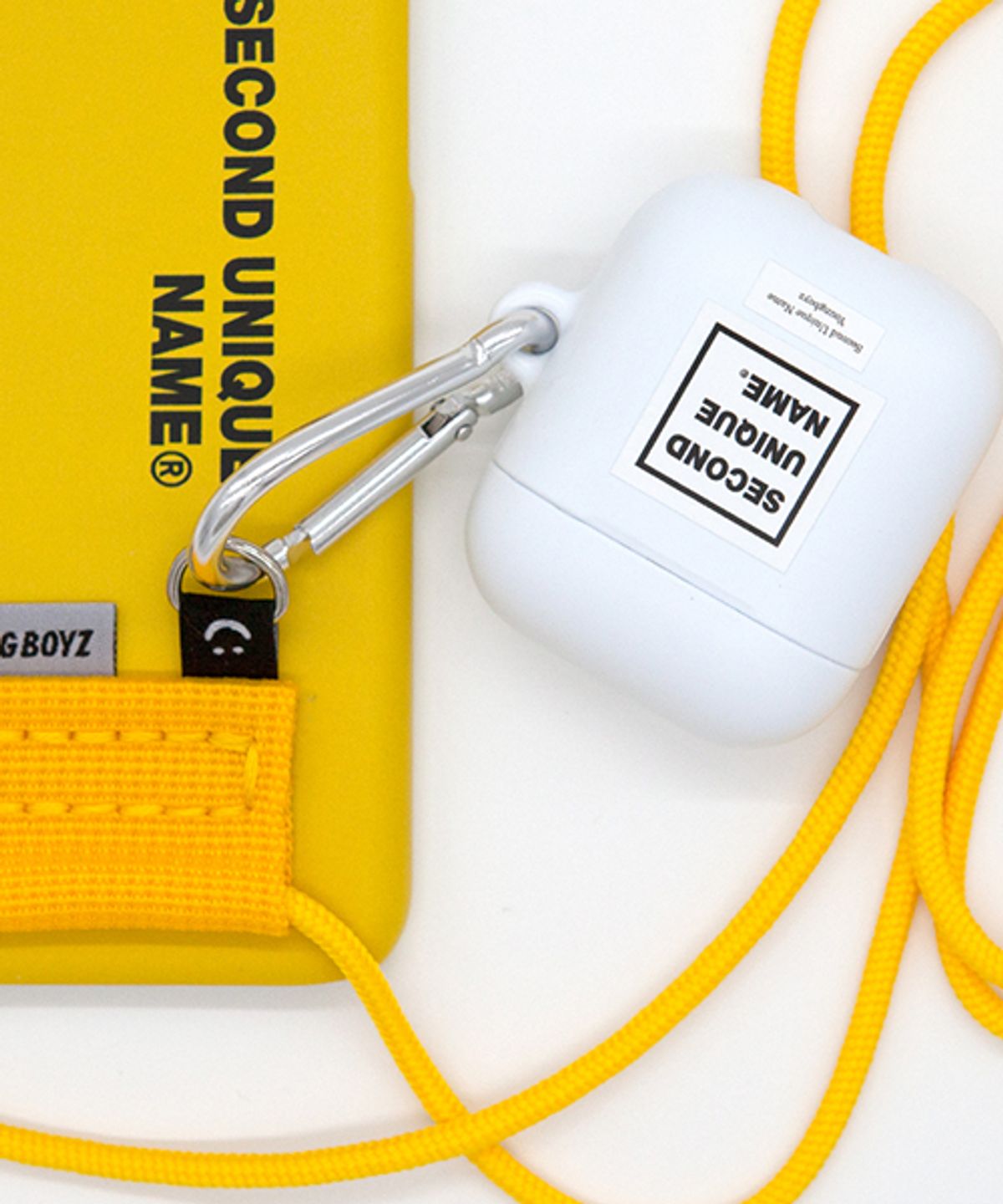 세컨드유니크네임(SECOND UNIQUE NAME) SUN CASE CROSS 2 YELLOW