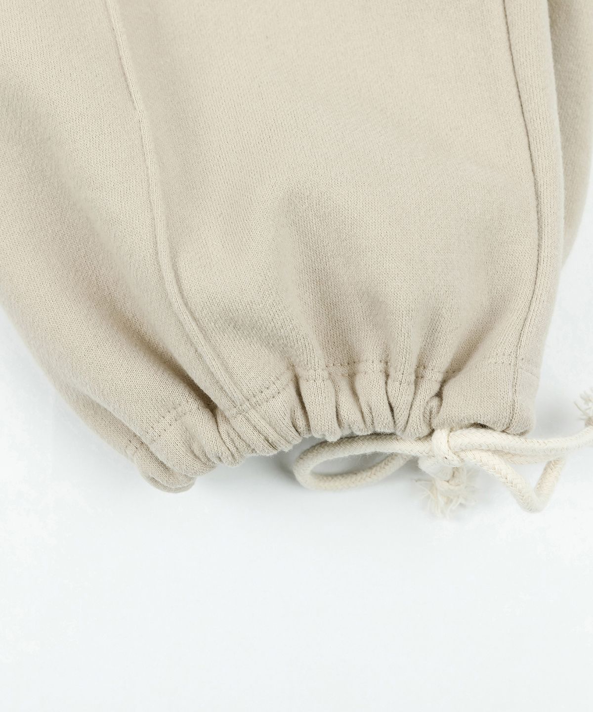 코튼벨(COTTON BELL) 피치스킨 기모 팬츠 - Beige