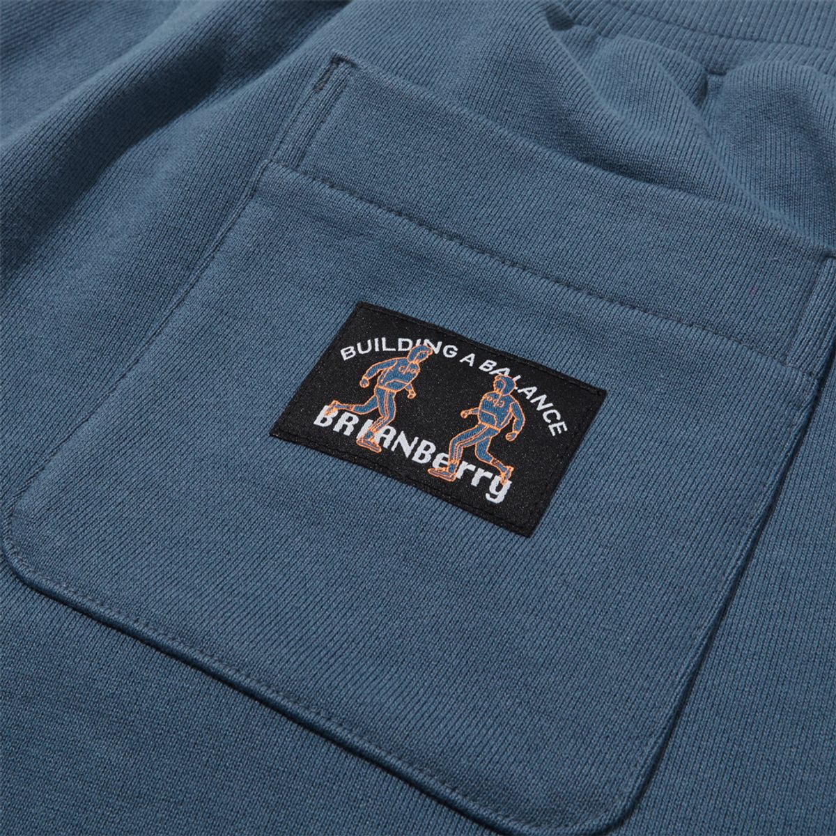 브라이언베리(BRIAN BERRY) VINTAGE LABEL SWEAT PANTS_HAZY BLUE