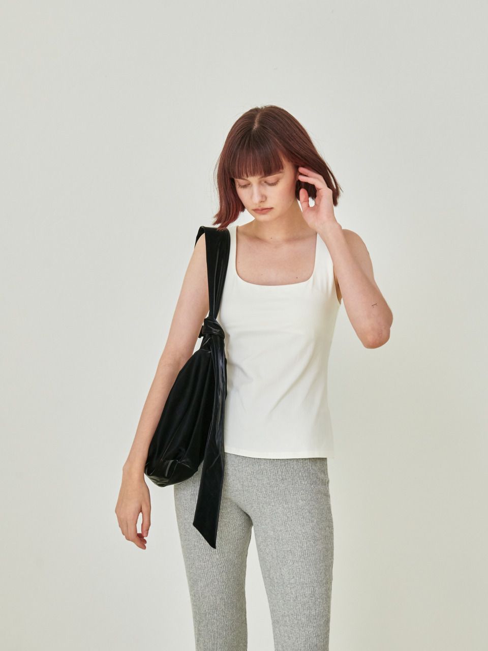MUSINSA | ACOC Glossy Halfmoon Cross Bag_Black