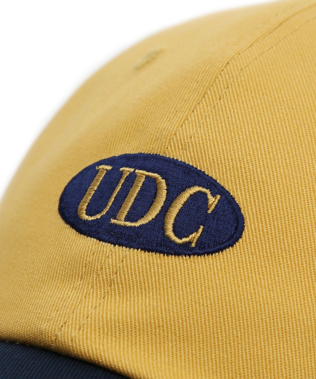 언더컨트롤(UNDERCONTROL) 코튼 로고 볼캡 ES UDC / AUTHENTIC B B / YELLOW NAVY