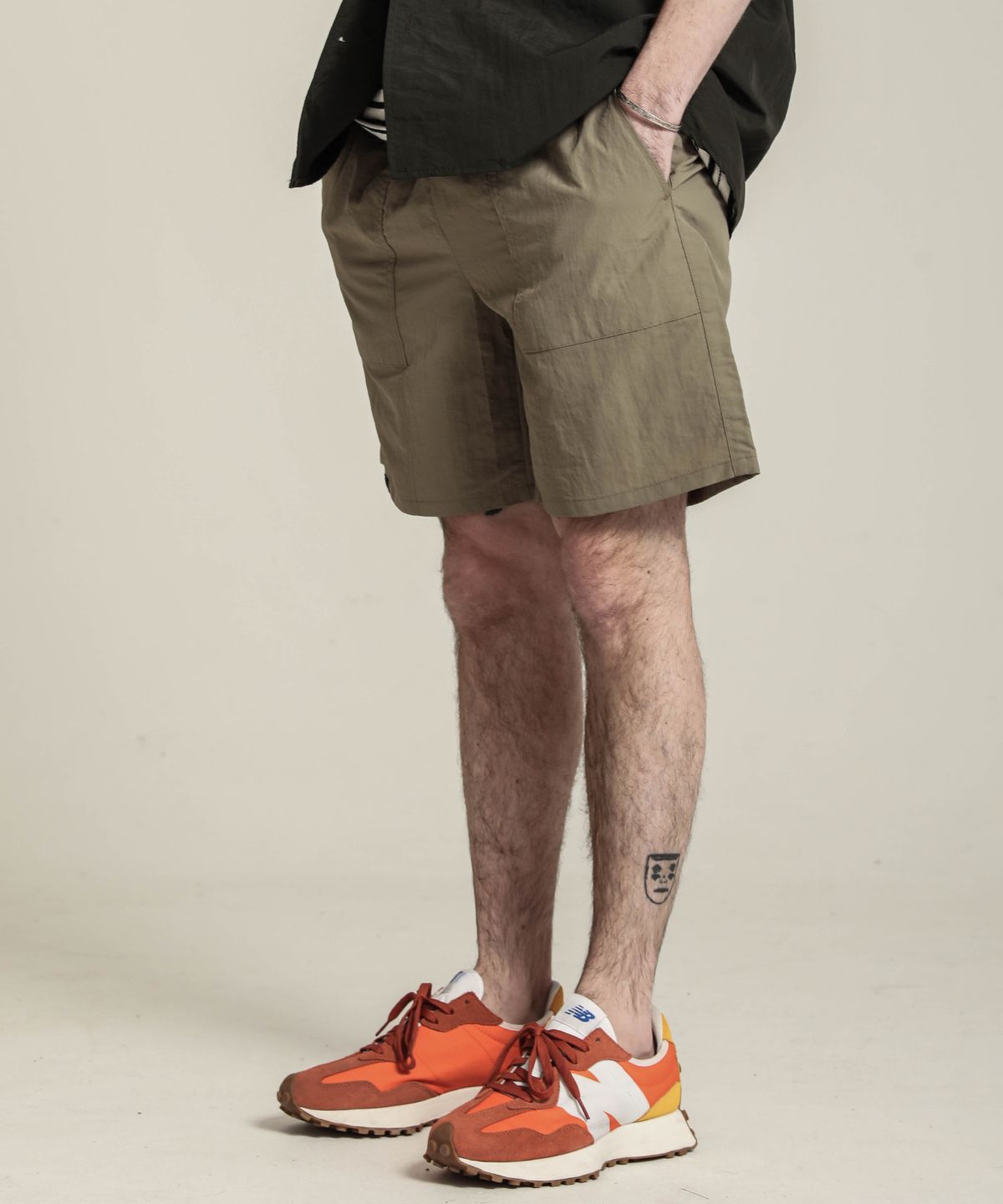 스테이지 네임(STAGE NAME) STGNM 밴딩 반바지_베이지