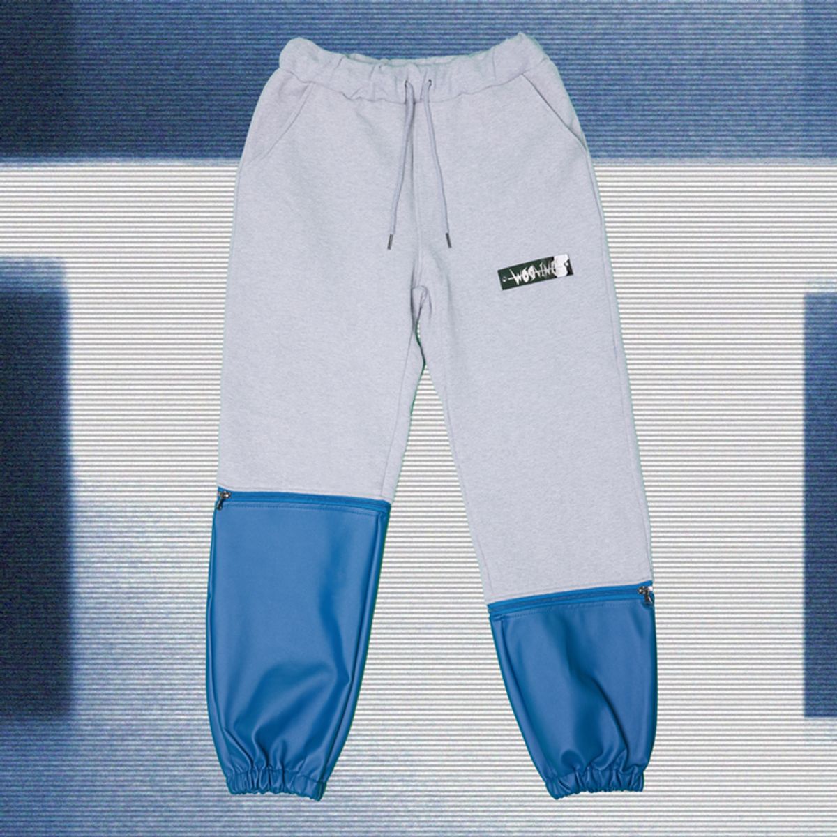 우빙(WOOVING) LEATHER COLORED SWEAT PANTS (BLUE)