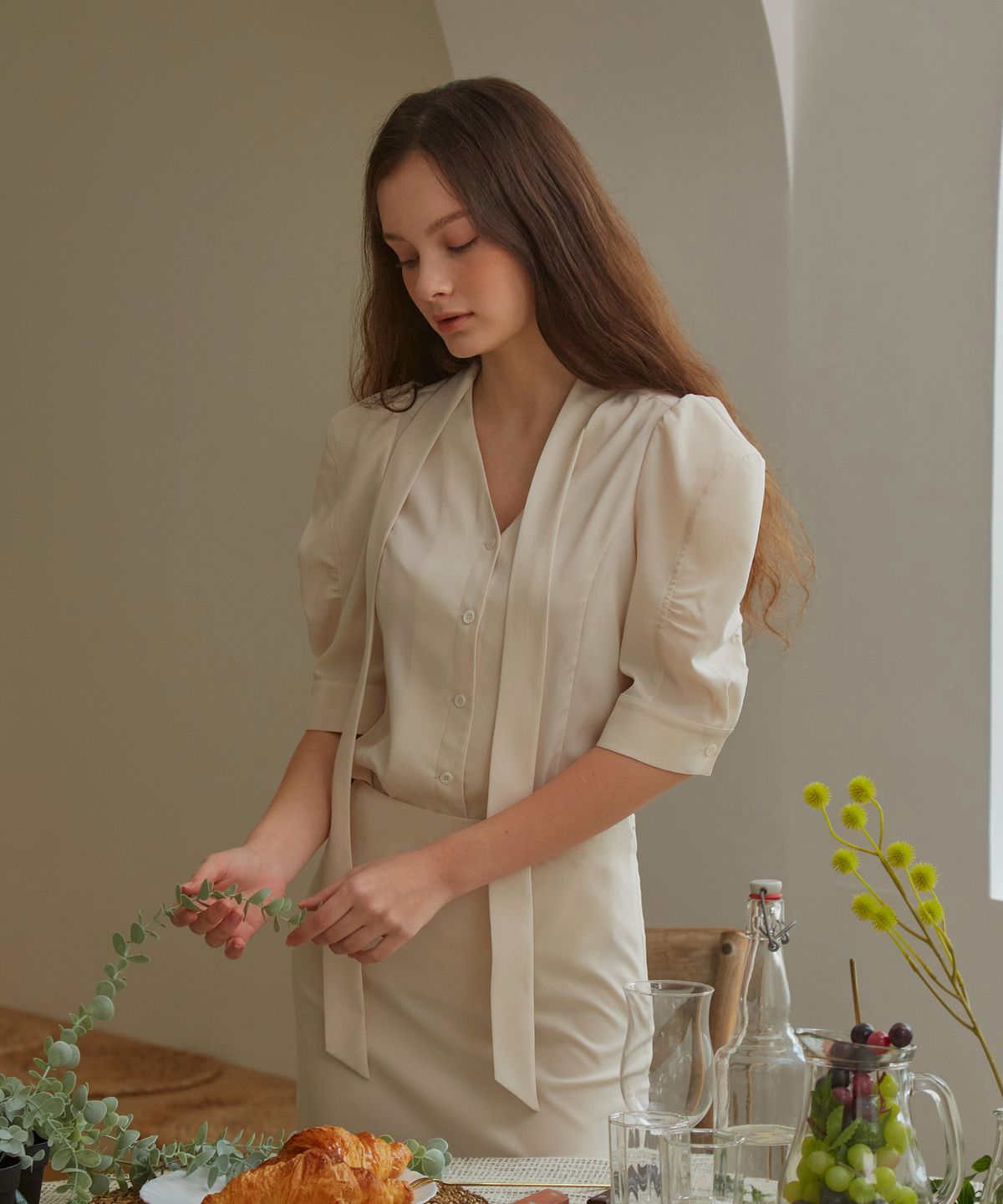 포지티브 바이브(POSITIVE VIBE) STELLA Bow collar shirt blouse with voluminious short sleeve detail(Butter Cream)