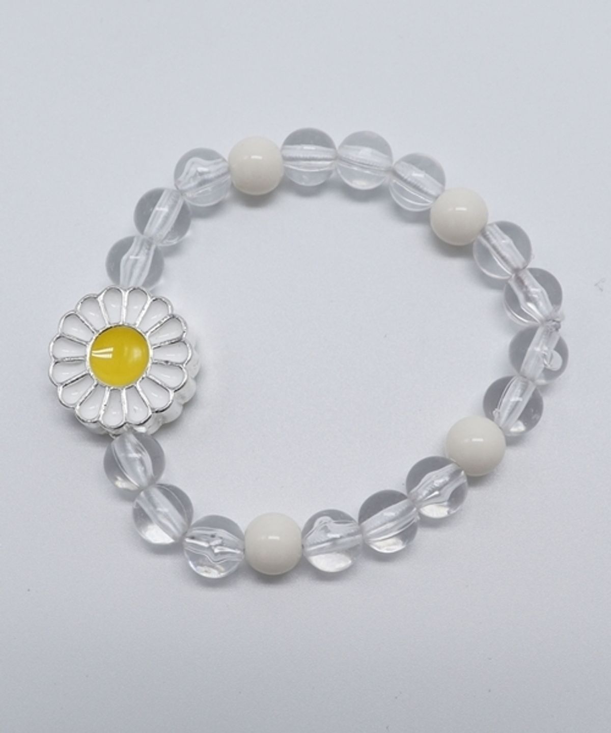 봉보(BONBEAU) Kitsch daisy acrylic Bracelet 브라스 데이지 투명 볼 팔찌