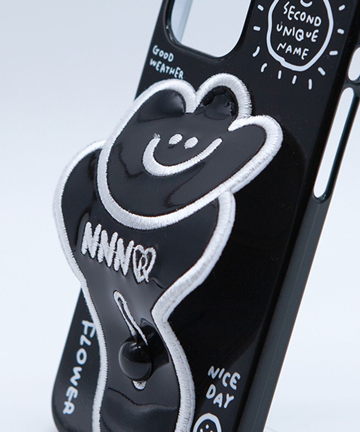 세컨드유니크네임(SECOND UNIQUE NAME) SUN CASE FLOWER PATCH BLACK